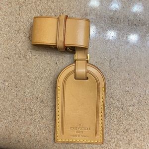 Louis Vuitton Authentic luggage tag